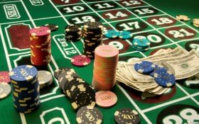 Teal dashboard showing casino-style win highlights and safety notes